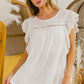 BiBi Ruffled Woven Cotton Top with white eyelet blouse, ruffled sleeves, beaded trim