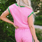 Pink textured romper with green trim, contrast round neck top and shorts set