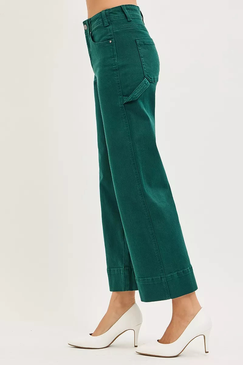 Back view of RISEN emerald green wide-leg denim pants with rolled cuff and cargo pocket