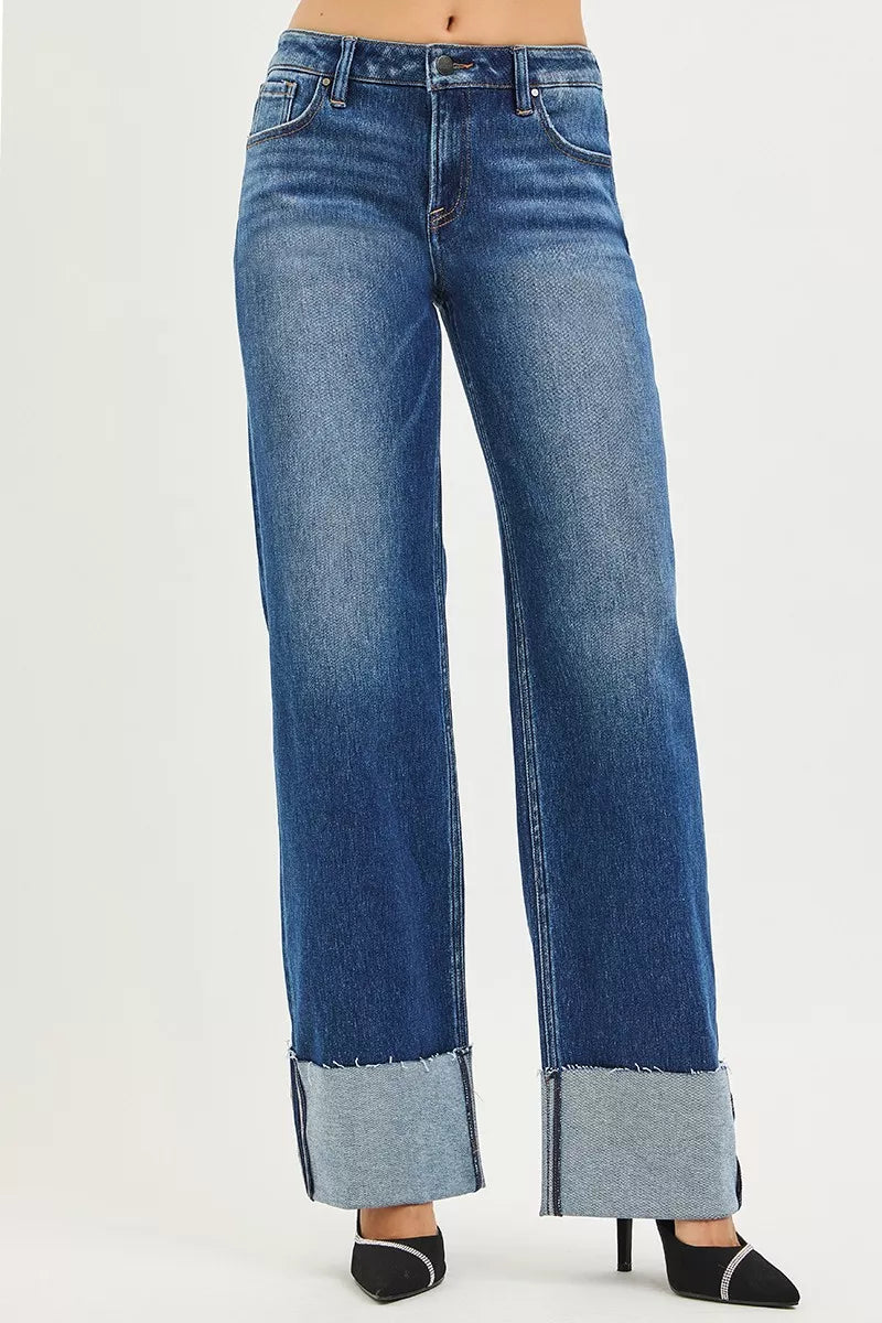 RISEN mid-rise wide straight jeans in blue denim with rolled cuffs