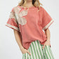 Umgee French Terry Top in soft coral with lace butterfly patch