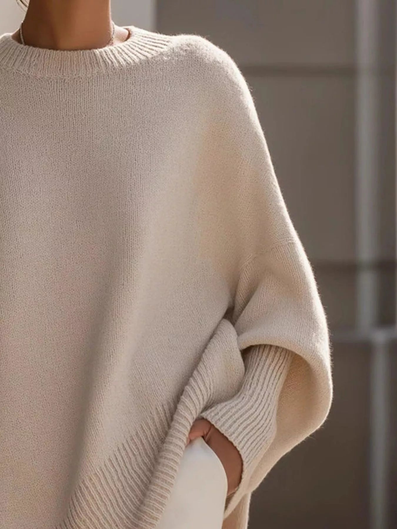 Cream-colored oversized batwing sleeve knit sweater for women