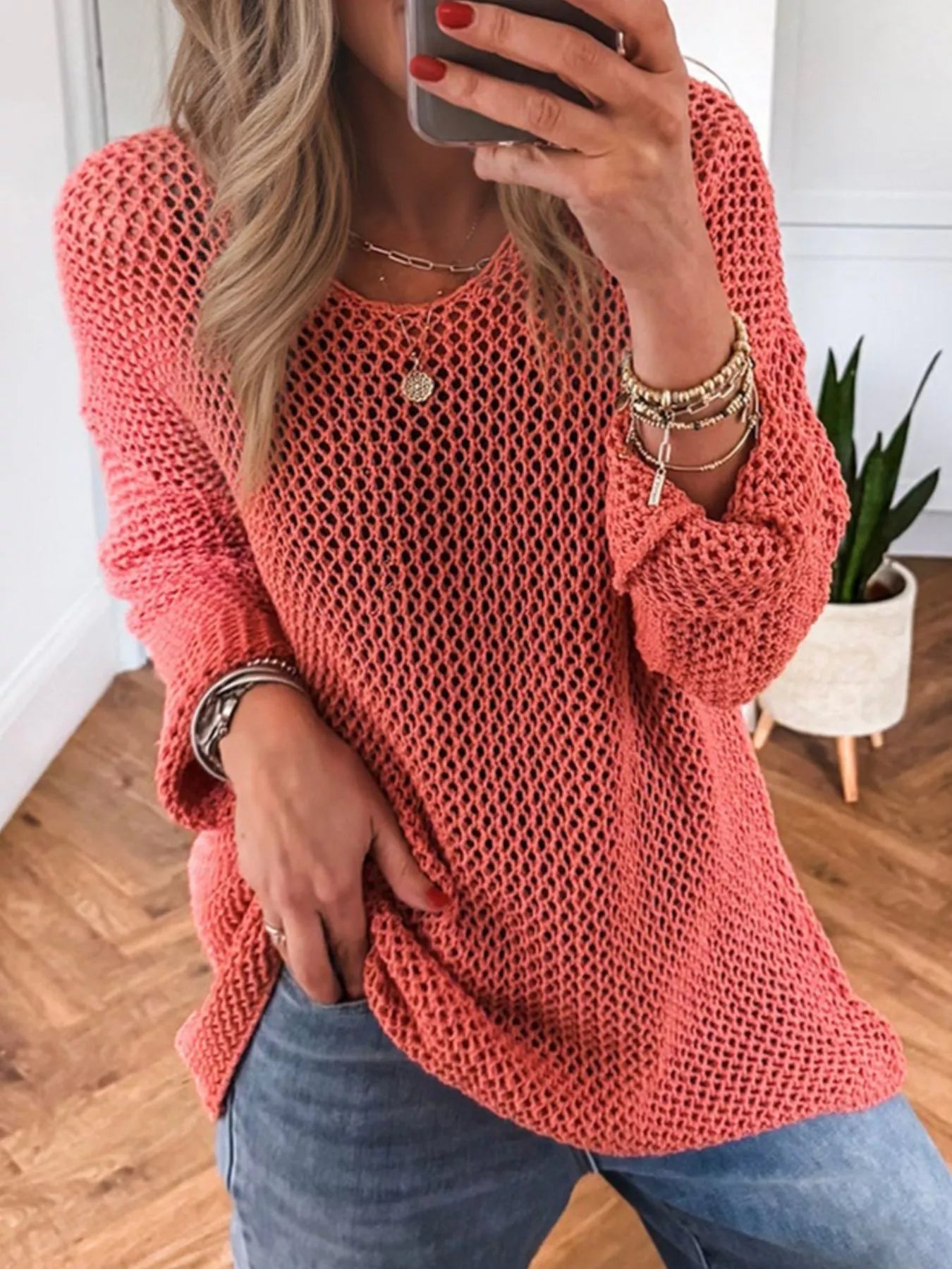 Coral crochet hollow out long sleeve knit top with loose fit
