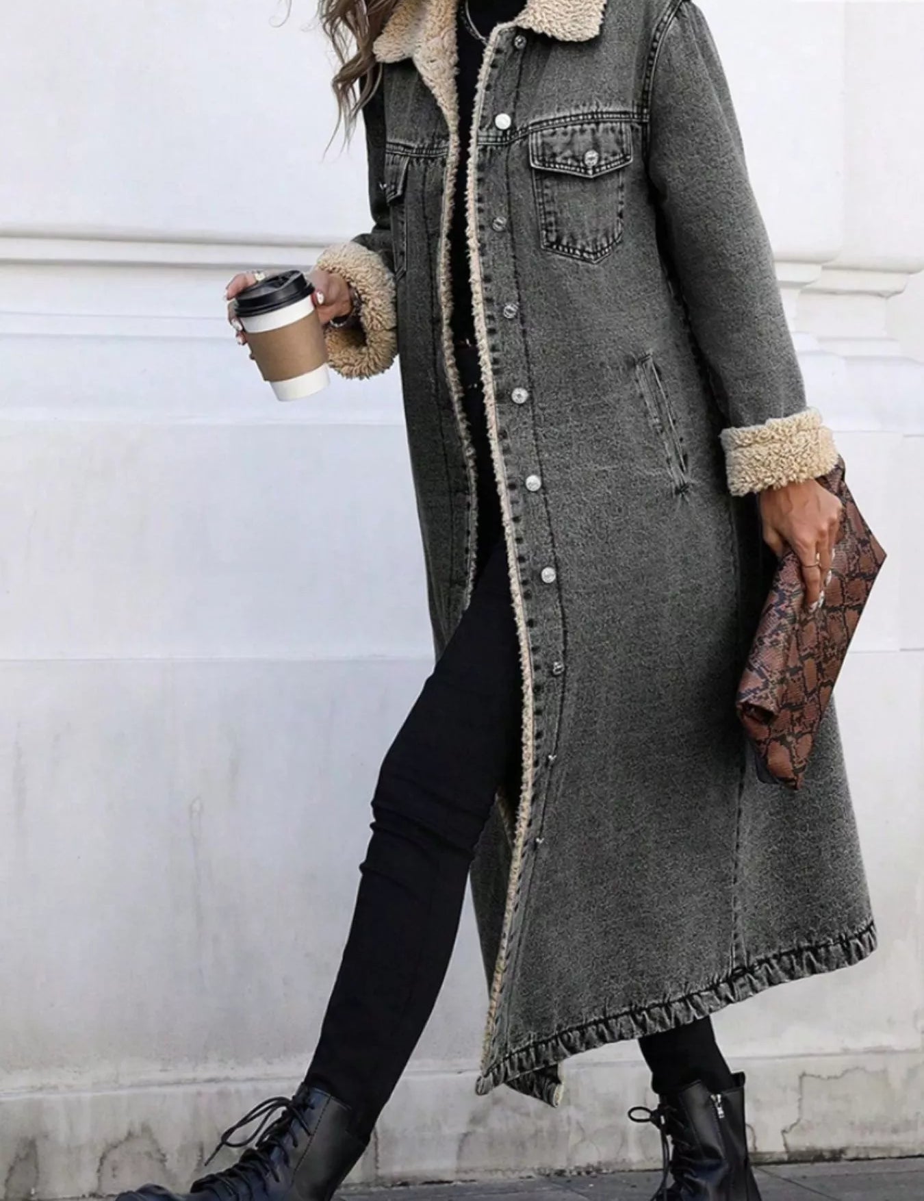 Gray shearling-lined longline denim jacket with pearl buttons and frayed hem