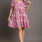Umgee Full Size Abstract Print Pleat Detail Short Sleeve V-Neck Tiered Dress Plus Size