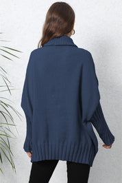 Navy blue oversized turtleneck sweater with ribbed detailing and long sleeves