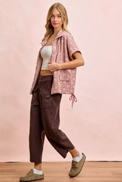 Pink floral short-sleeved vest with drawstring waist, pockets, and BiBi Washed Terry Pants in Vintage Mocha