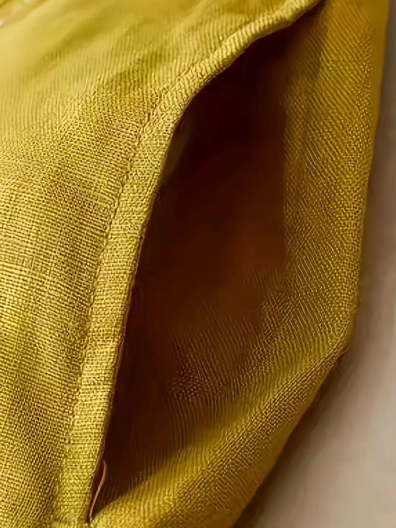 Daverri wide-leg pants golden-yellow silk-like fabric with woven texture and seam