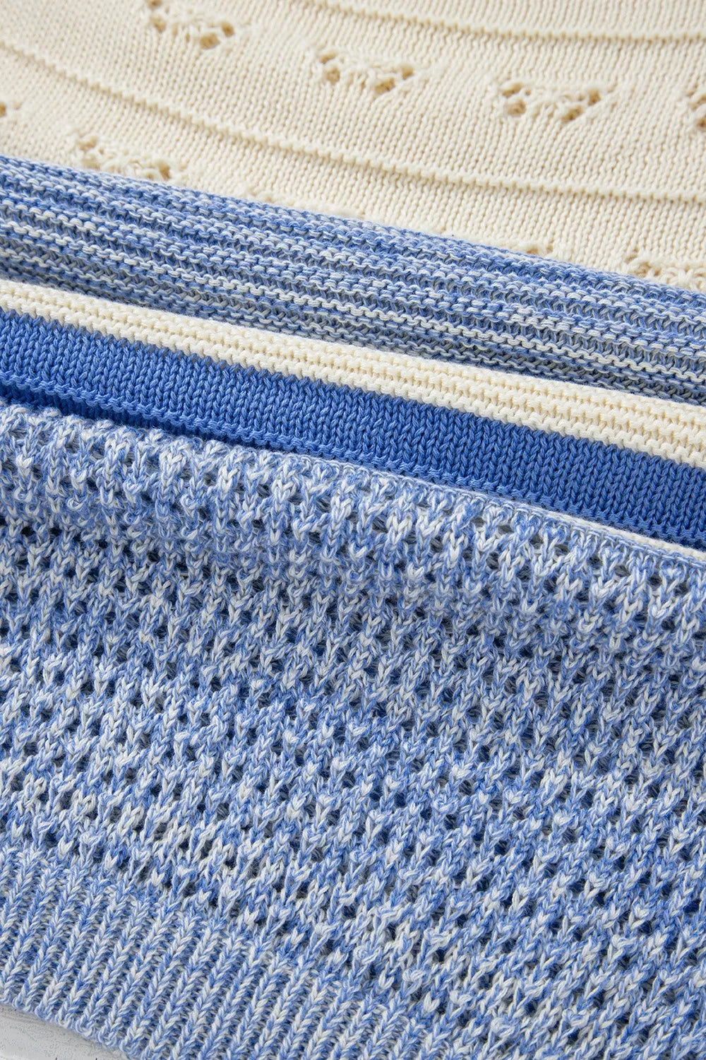 Blue and white openwork striped knit long sleeve sweater