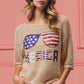 BiBi sequin American flag sunglasses knit cover up with beige sweater and Merica lettering