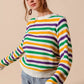 Vibrant SO ME Mardi Gras color stripe knit sweater top with bold horizontal stripes in purple, green, yellow, and white
