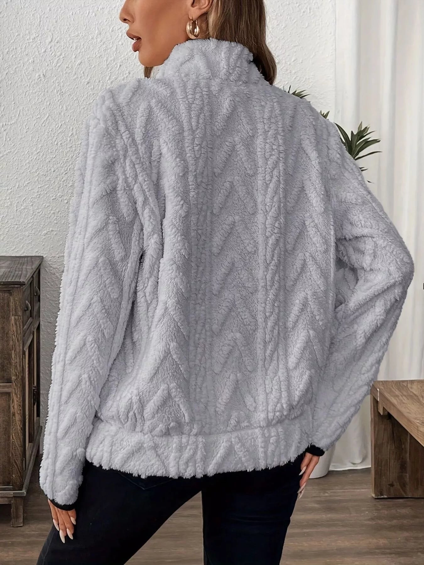 Light gray plush faux fur jacket with high collar and cable-knit texture