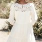 Back view of 3/4 sleeve tiered mini dress with lace panel