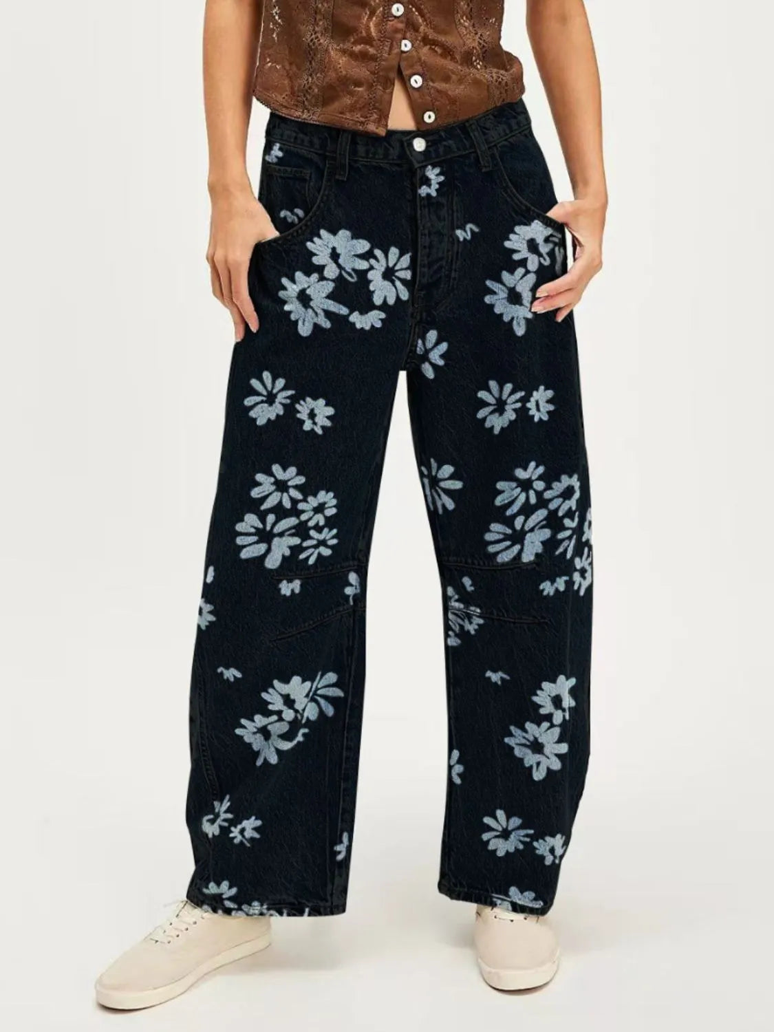 Printed wide leg jeans in black denim with light blue floral pattern