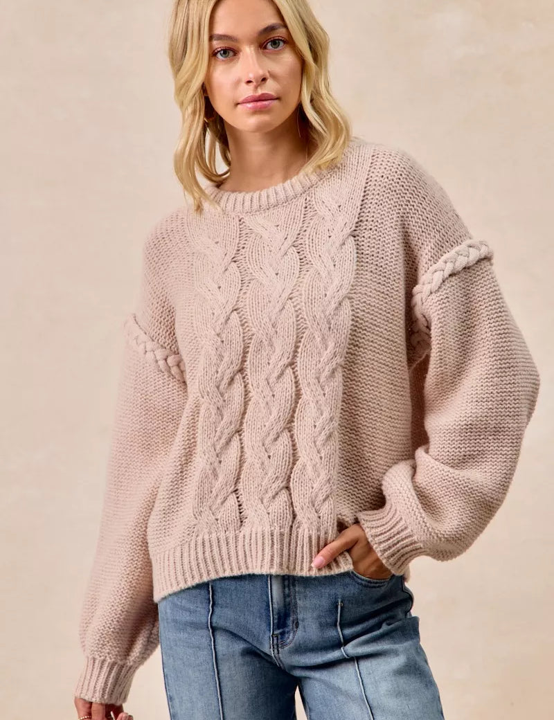 Dusty rose BiBi cable knit sweater with balloon sleeves and ribbed hem