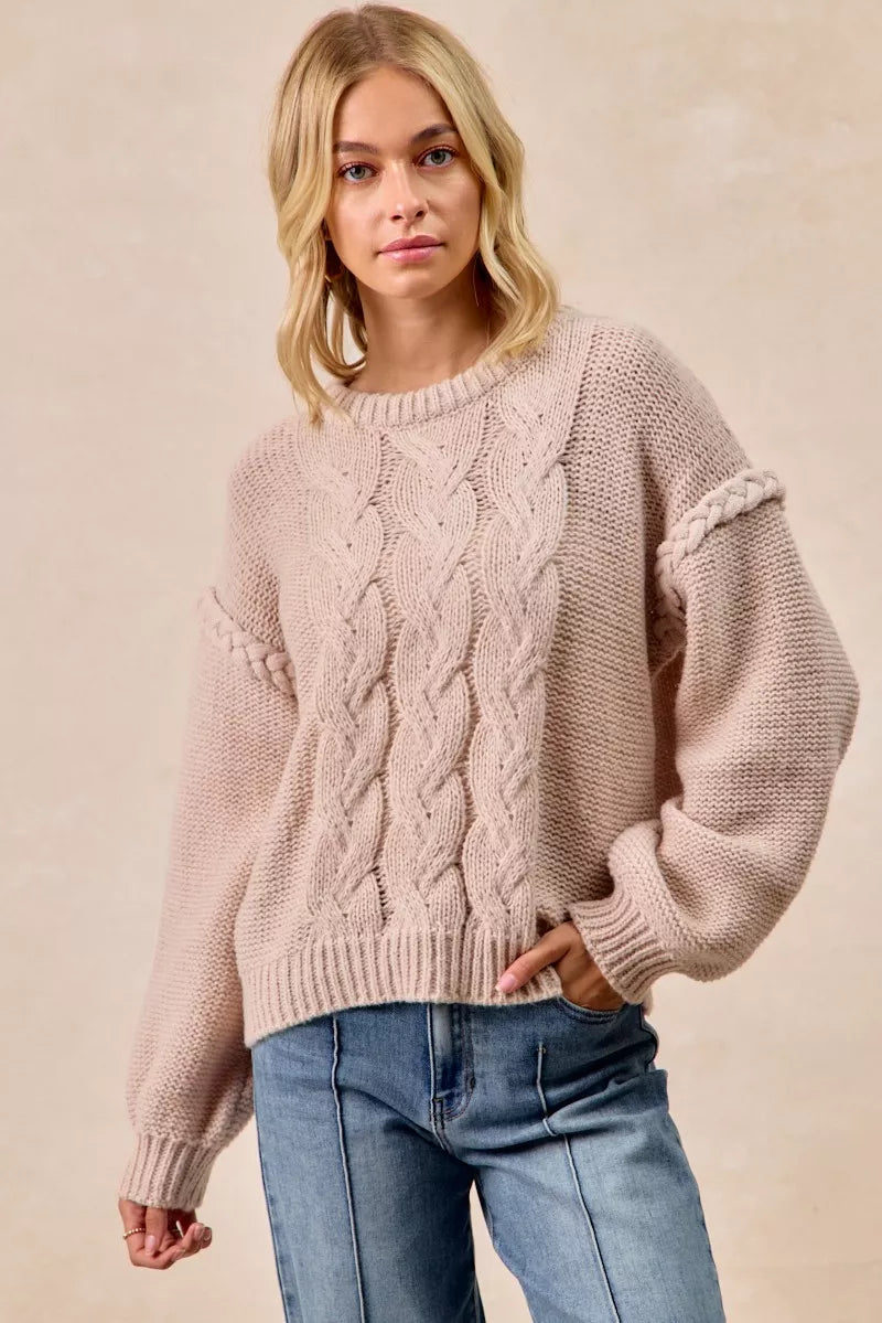 Dusty rose BiBi cable knit sweater with balloon sleeves and ribbed hem