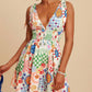 Daverri V-Neck Sleeveless Smocked Waist Printed Mini Dress with vibrant patchwork