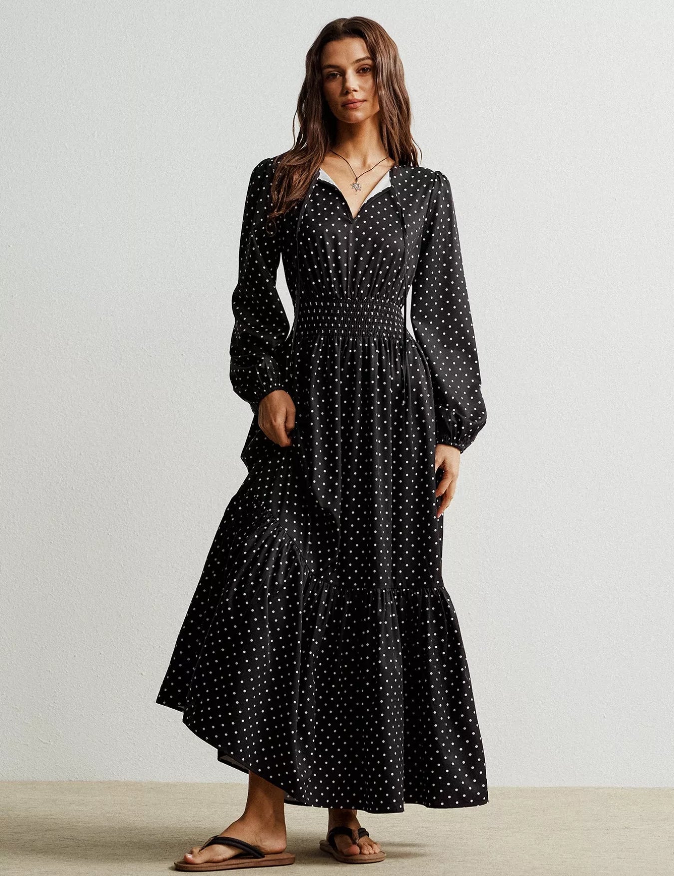 Black polka dot long sleeve maxi dress with ruffled hem