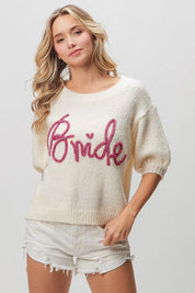 Cream-colored bride sweater with pink embroidery and short puff sleeves