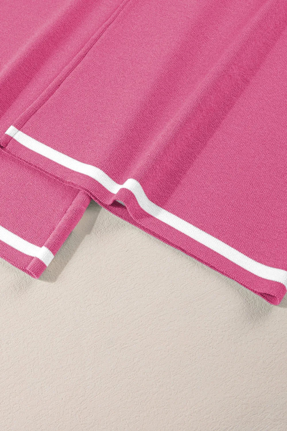 Pink and white striped track pants with elastic waistband from set