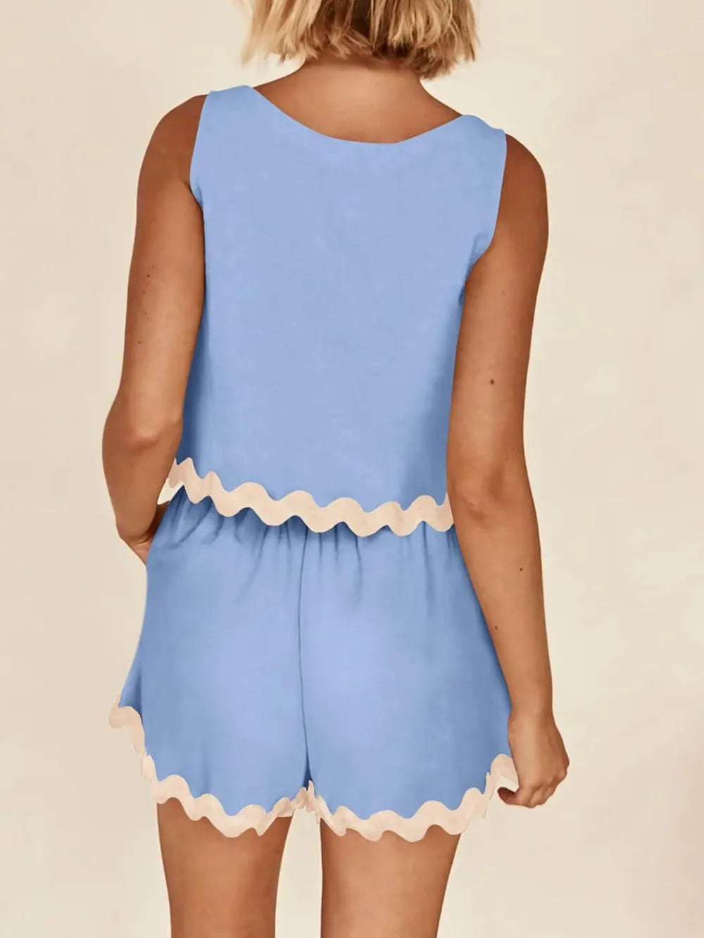 Daverri Fashions light blue sleeveless top and shorts set with cream trim