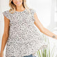 Heimish Full Size Tiered Ruffled Animal Print Round Neck Blouse Plus Size Ivory Black Blouses