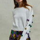 White SO ME Mardi Gras glitter bow sweater with sequined stars on sleeves