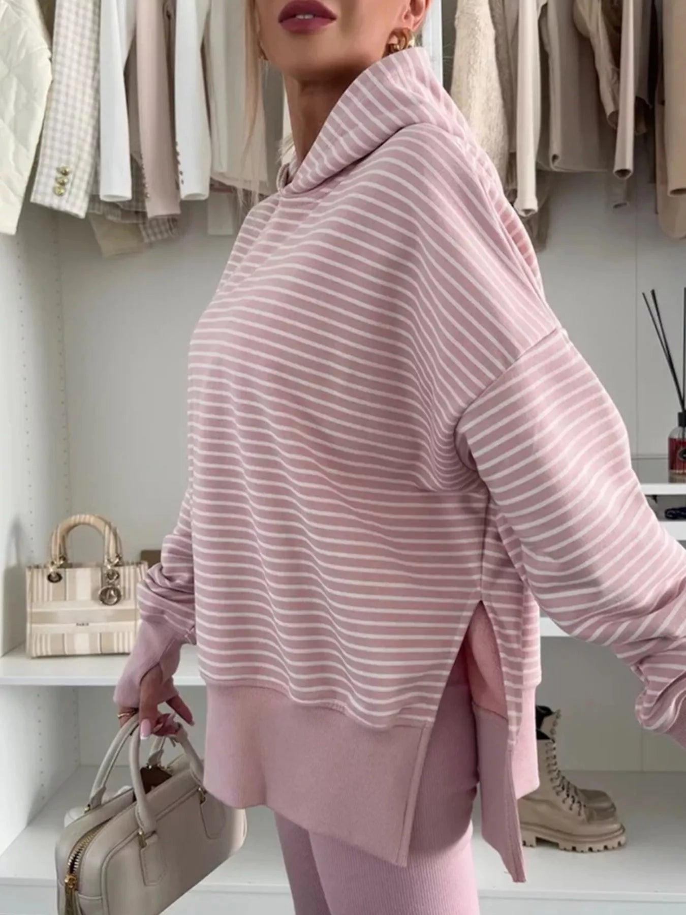 Dusty pink striped thumbhole hoodie with side slits and drop shoulders