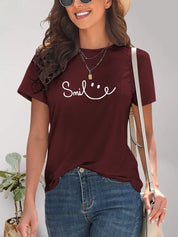Burgundy short-sleeved SMILE t-shirt with smiley face graphic
