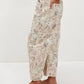 Printed wide-leg jeans with faded floral pattern in beige, pink, gray
