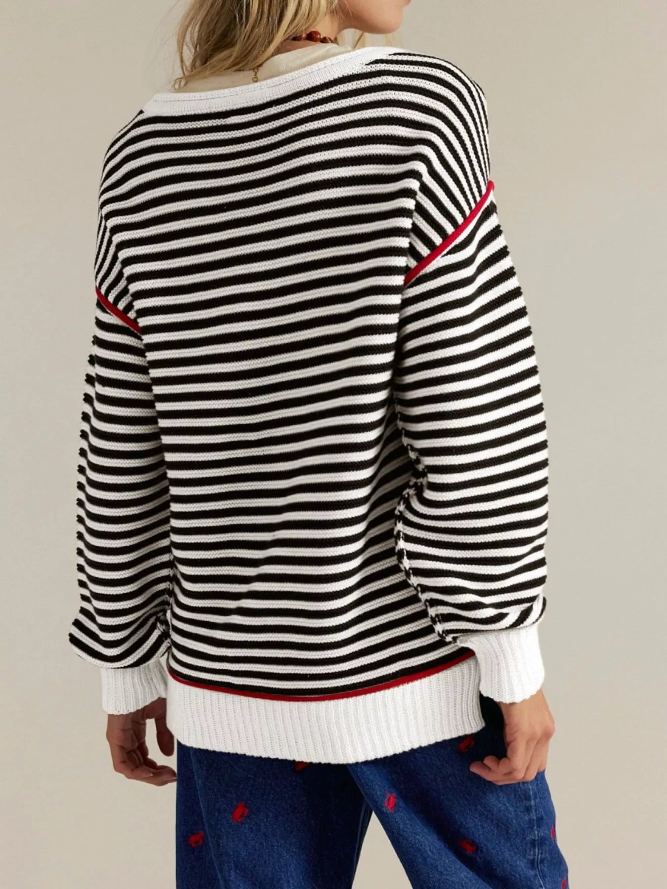 Black and white striped round neck long sleeve knit sweater with red trim
