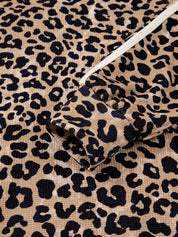 Leopard print long sleeve hoodie with white drawstring and pocket