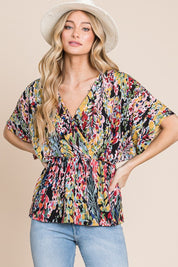 BOMBOM Printed Surplice Peplum Blouse | Daverri Fashions