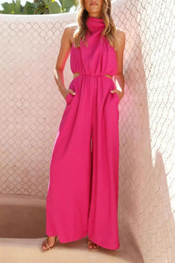 Vibrant fuchsia cutout sleeveless wide-leg halter jumpsuit