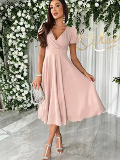 Soft pink surplice short sleeve midi dress with v-neck and puffed sleeves