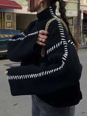 Black and white striped mock neck sweater with bell sleeves