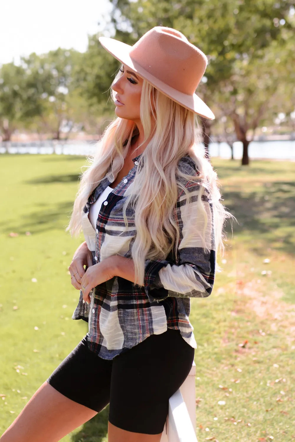 Soft peach felt fedora with wide brim on Daverri plaid shirt
