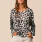 BiBi Leopard Hacci Knit Twist Back Top With Stripe Sleeve Tops