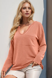 Soft peach ribbed knit V-neck long-sleeve top with front pocket