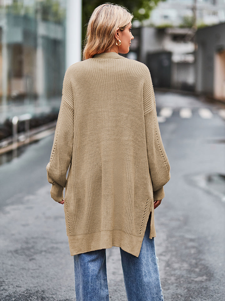 Beige long sleeve waffle-knit cardigan with ribbed cuffs and slanted hem