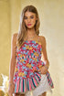 Davi & Dani floral smocked sleeveless ruffle back tie top in vibrant multicolored floral and striped pattern with thin straps