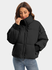 Black zip-up turtleneck puffer jacket with ruffled sleeves