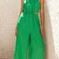 Vibrant emerald green cutout sleeveless wide-leg jumpsuit
