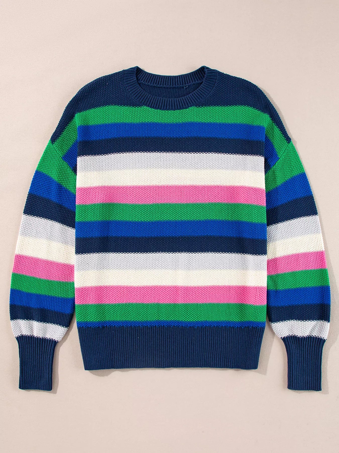 Rainbow Striped Crew Neck Drop Shoulder Sweater in blue, green, pink, white stripes on dark background