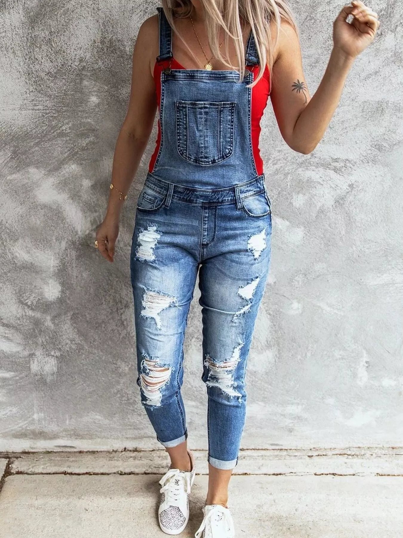 Daverri wide strap distressed denim overalls with ripped details and rolled cuffs
