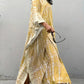 Flowing yellow and cream tie-dye V-neck maxi dress with bell sleeves and side slits