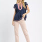 Umgee navy blue linen ruffle sleeve top with pink trim and v-neckline