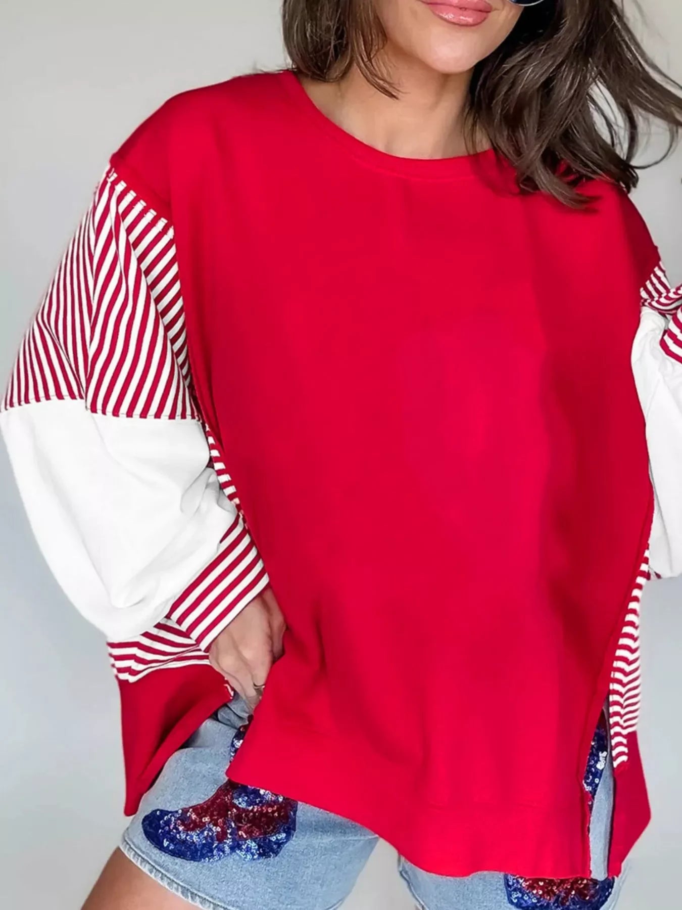 Red and white striped patchwork sleeve colorblock sweatshirt