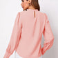 Ruched mock neck long sleeve blouse in soft pink with puffed shoulders