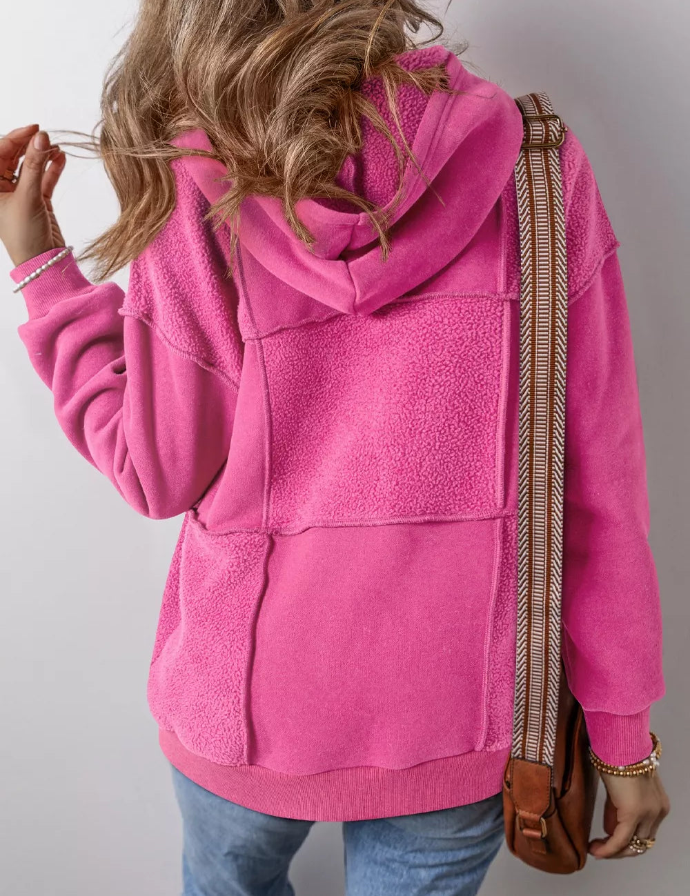 Hot pink oversized Sherpa patchwork hoodie with drawstring hood and pocket